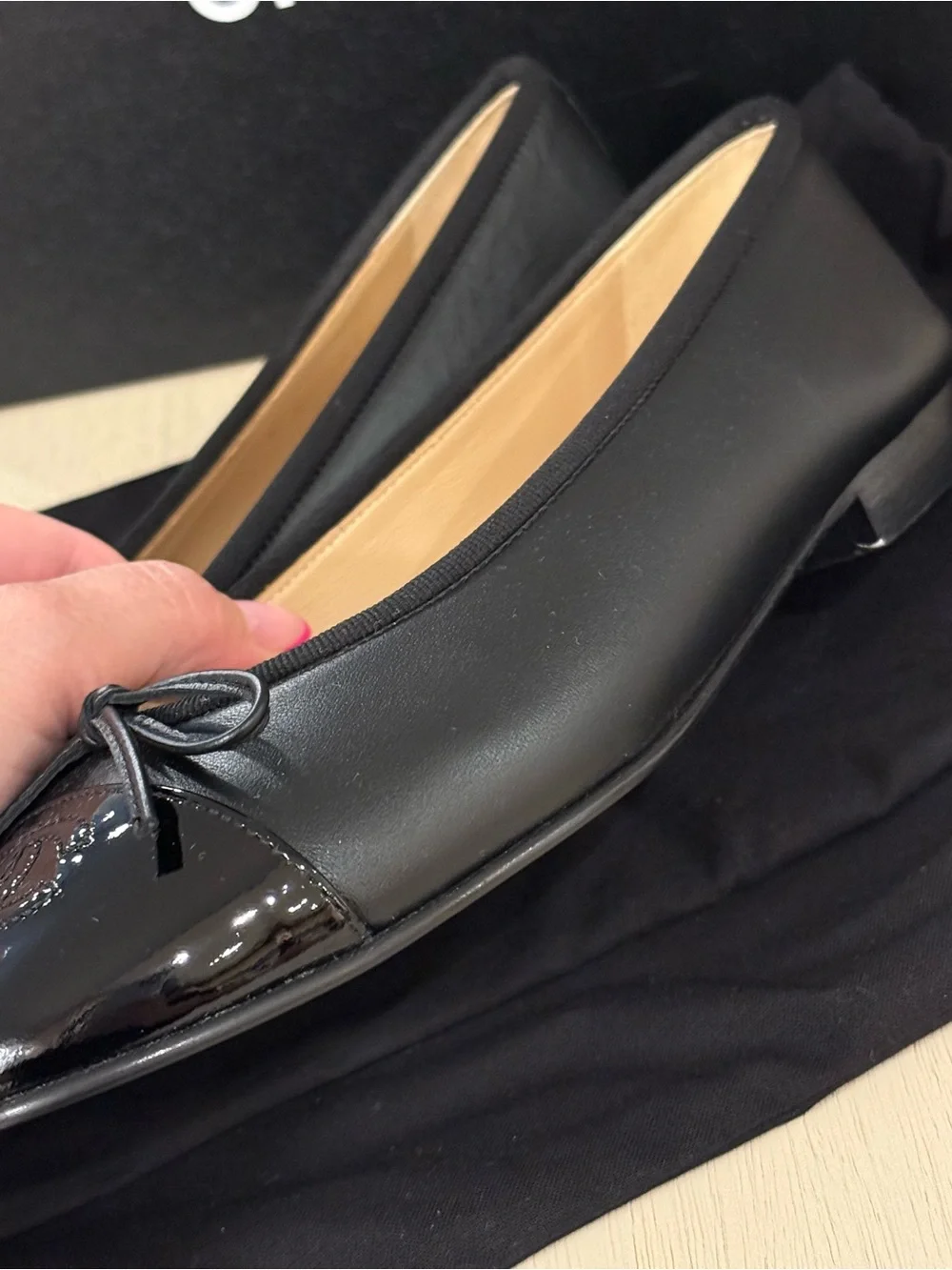 CHANEL Black Leather Cap-Toe Bow Ballet Flats